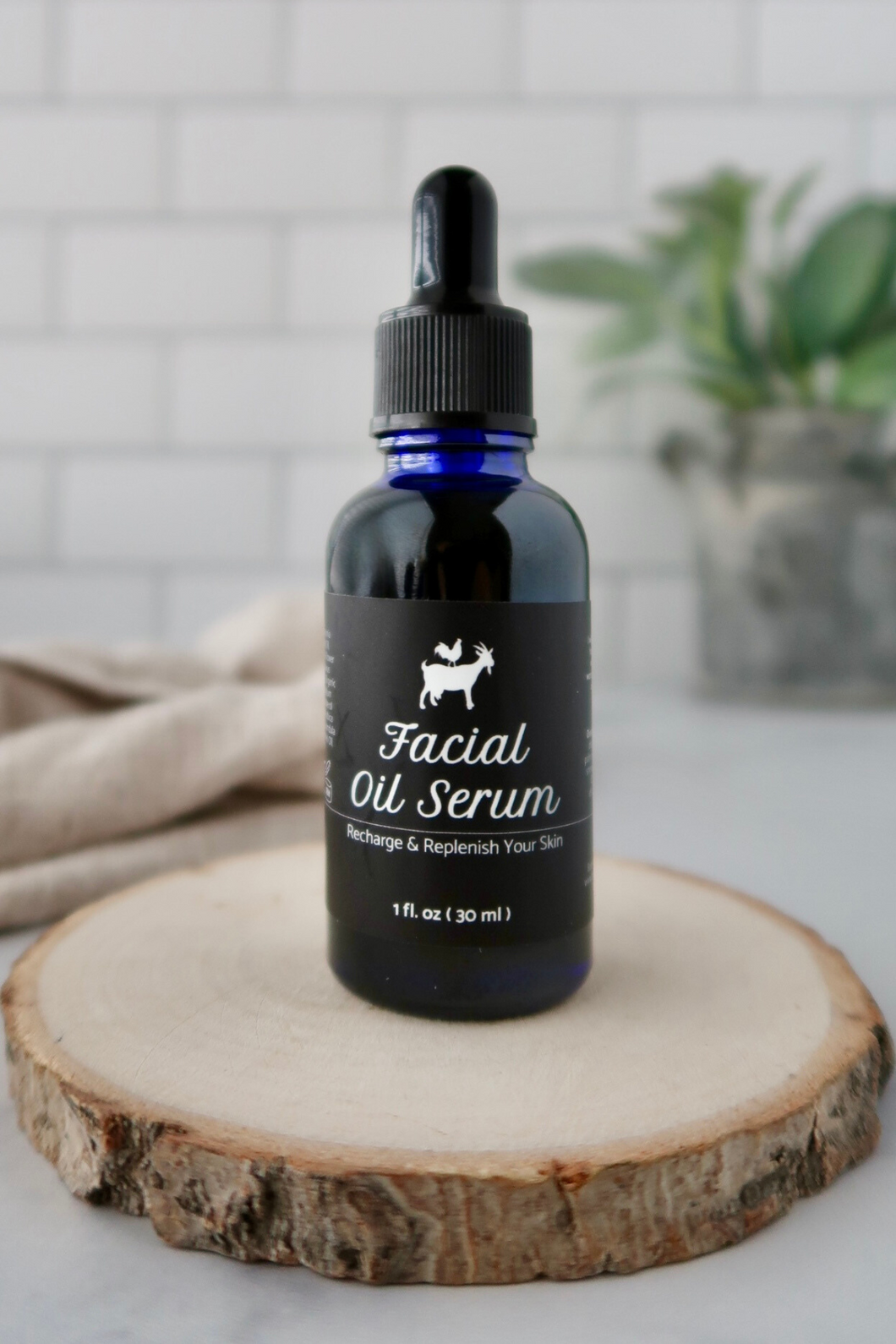Facial oil serum in 1 oz dropper bottle
