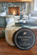Load image into Gallery viewer, Christmas Cabin Concrete Candle in Gold marbled jar