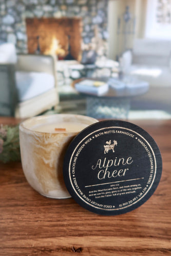 Alpine Cheer Concrete Candle in gold marbled jar
