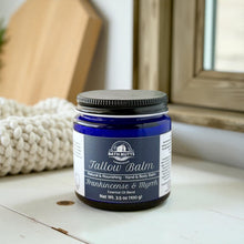 Load image into Gallery viewer, Blue Jar of Bath Nutts Farmhouse Tallow Balm on a wooden surface