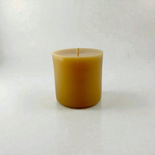 Load image into Gallery viewer, Pure beeswax candle on light gray background