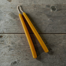 Load image into Gallery viewer, Hand-Dipped Beeswax Taper Candles by Bath Nutts Farmhouse on a wooden surface